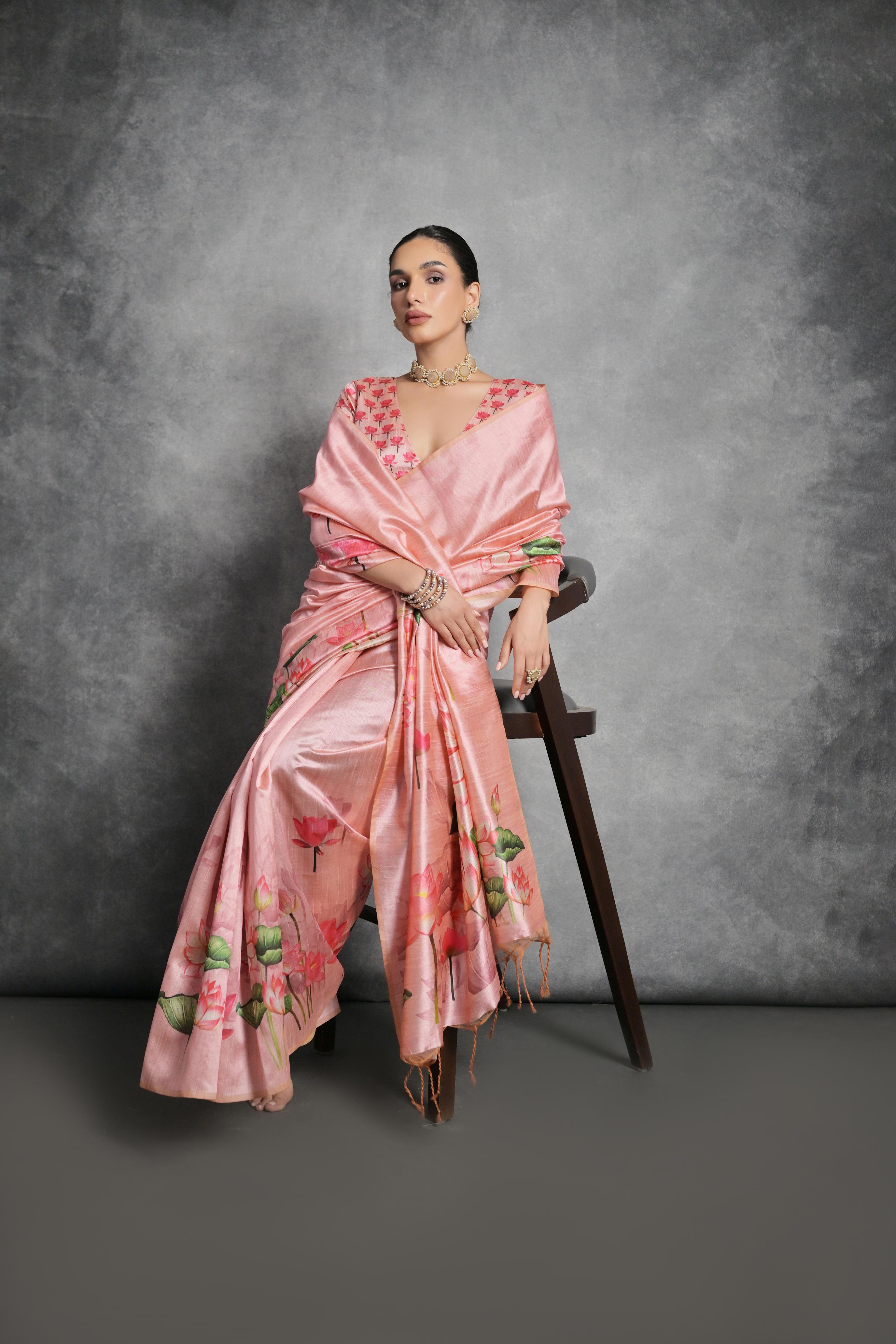 Pink soft Tussar silk saree featuring elegant floral prints with an unstitched blouse piece