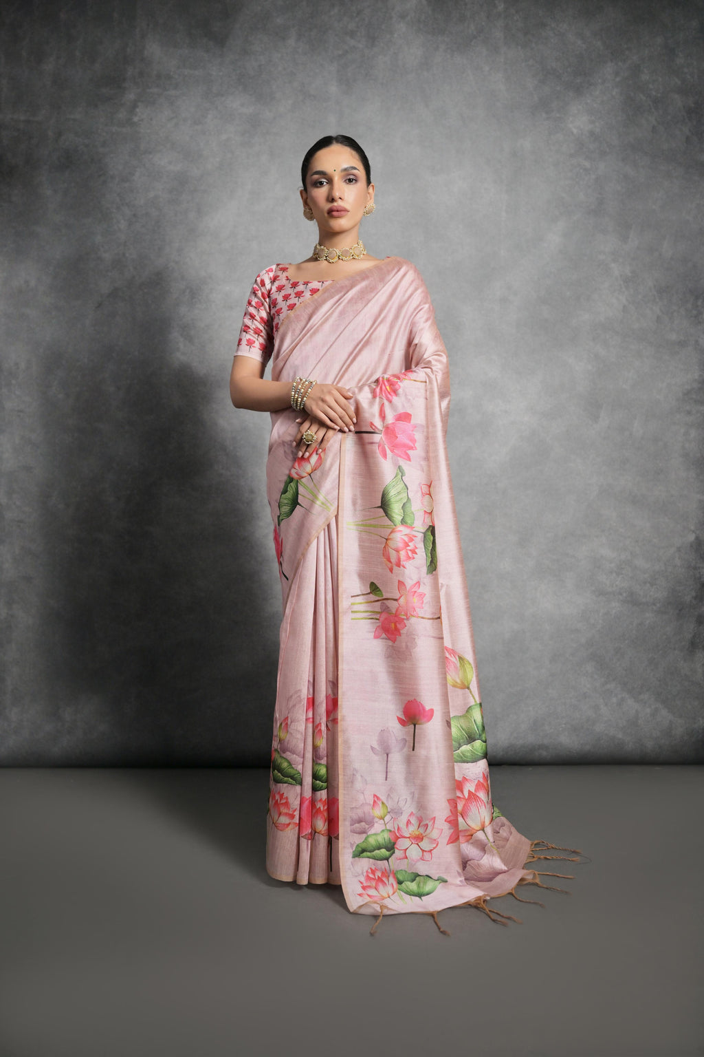 Peach soft Tussar silk saree with delicate floral print patterns and matching blouse