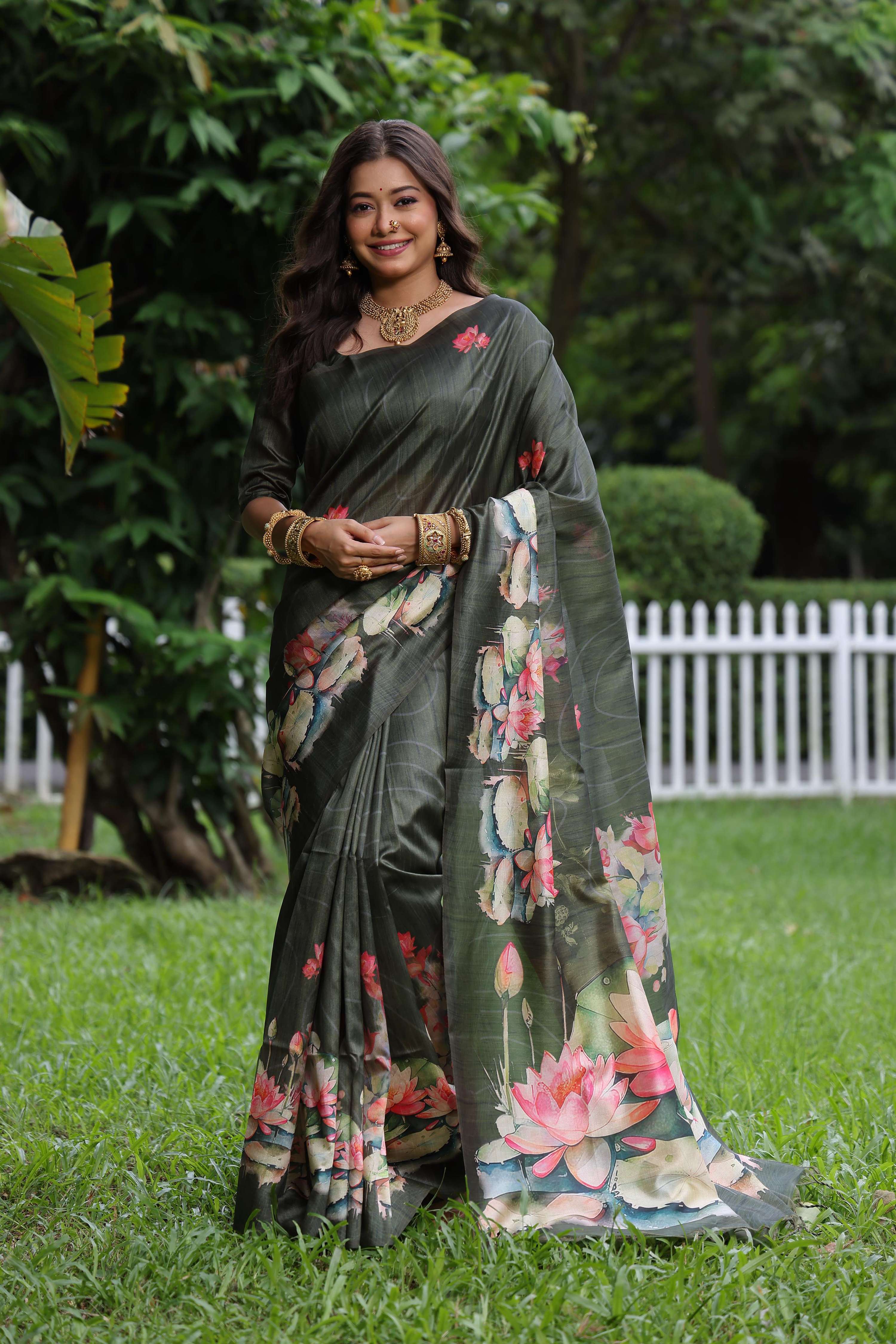 Mehendi green soft Tussar silk saree with delicate floral print and matching blouse piece
