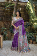 Purple Tussar silk saree with intricate Madhubani floral patterns