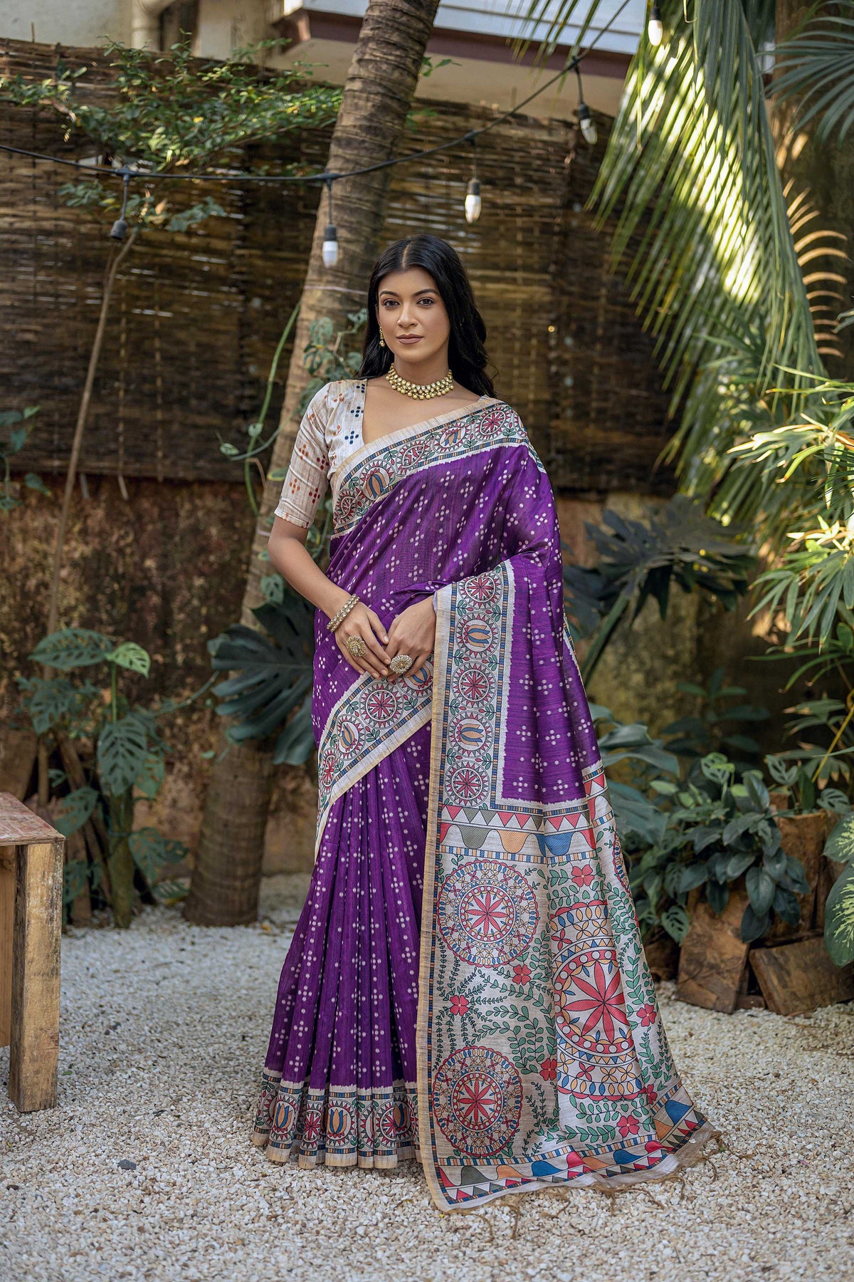 Purple Tussar silk saree with intricate Madhubani floral patterns