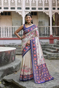 Royal blue soft Tussar silk saree featuring elegant floral prints and matching blouse.