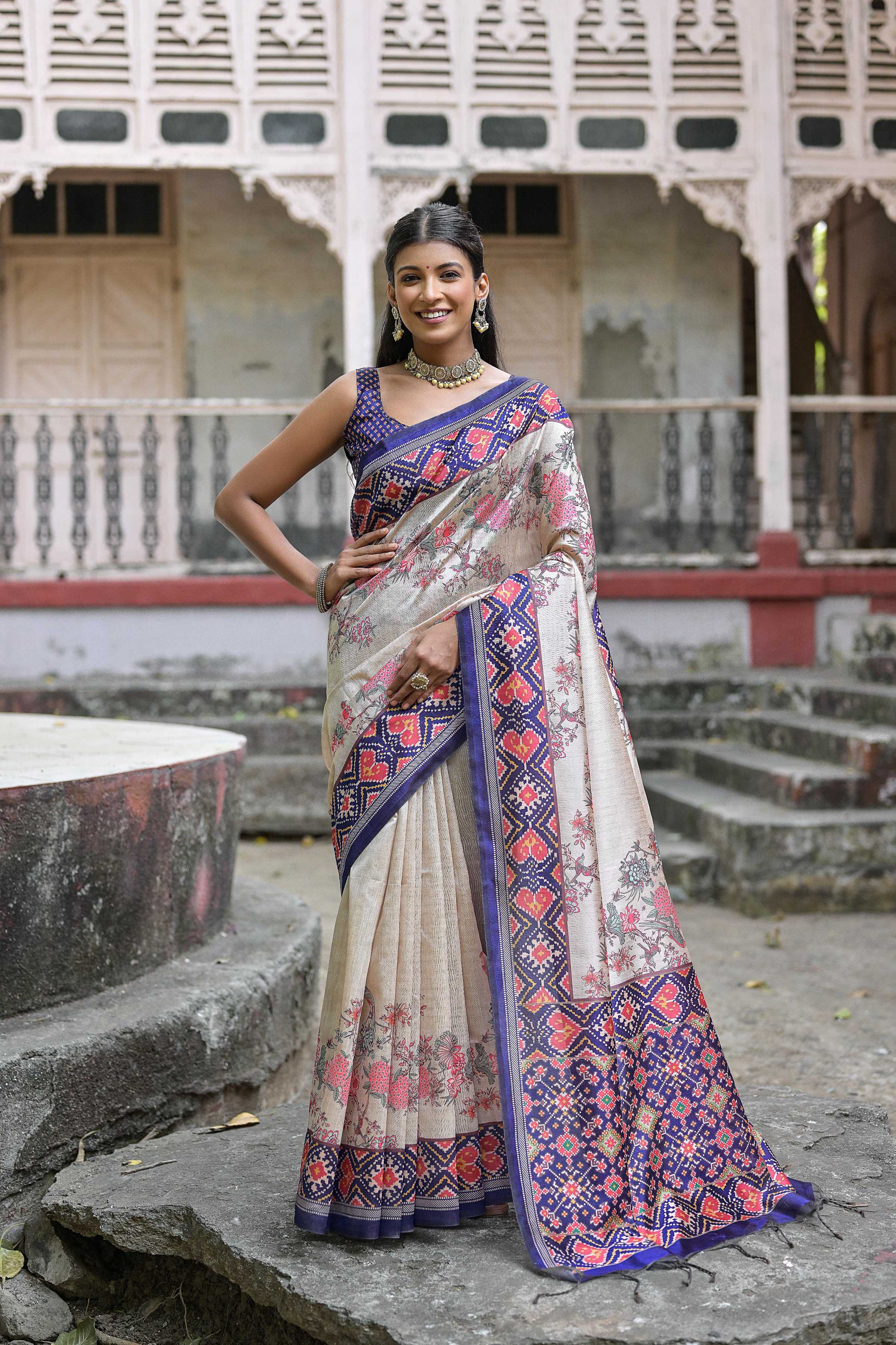 Royal blue soft Tussar silk saree featuring elegant floral prints and matching blouse.