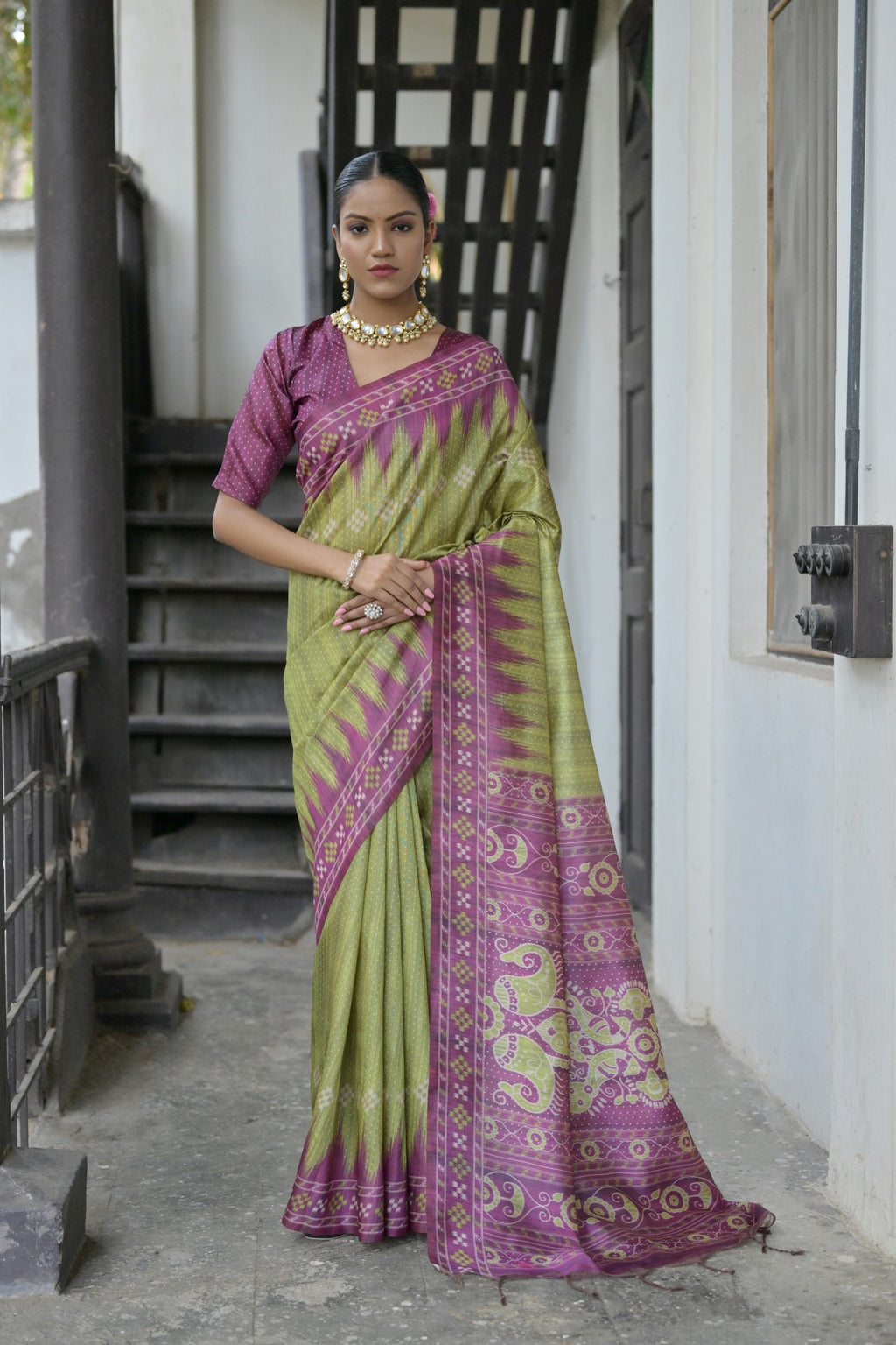 Green Tussar silk saree with traditional temple border and Ikkat print details