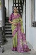 Green Tussar silk saree with traditional temple border and Ikkat print details