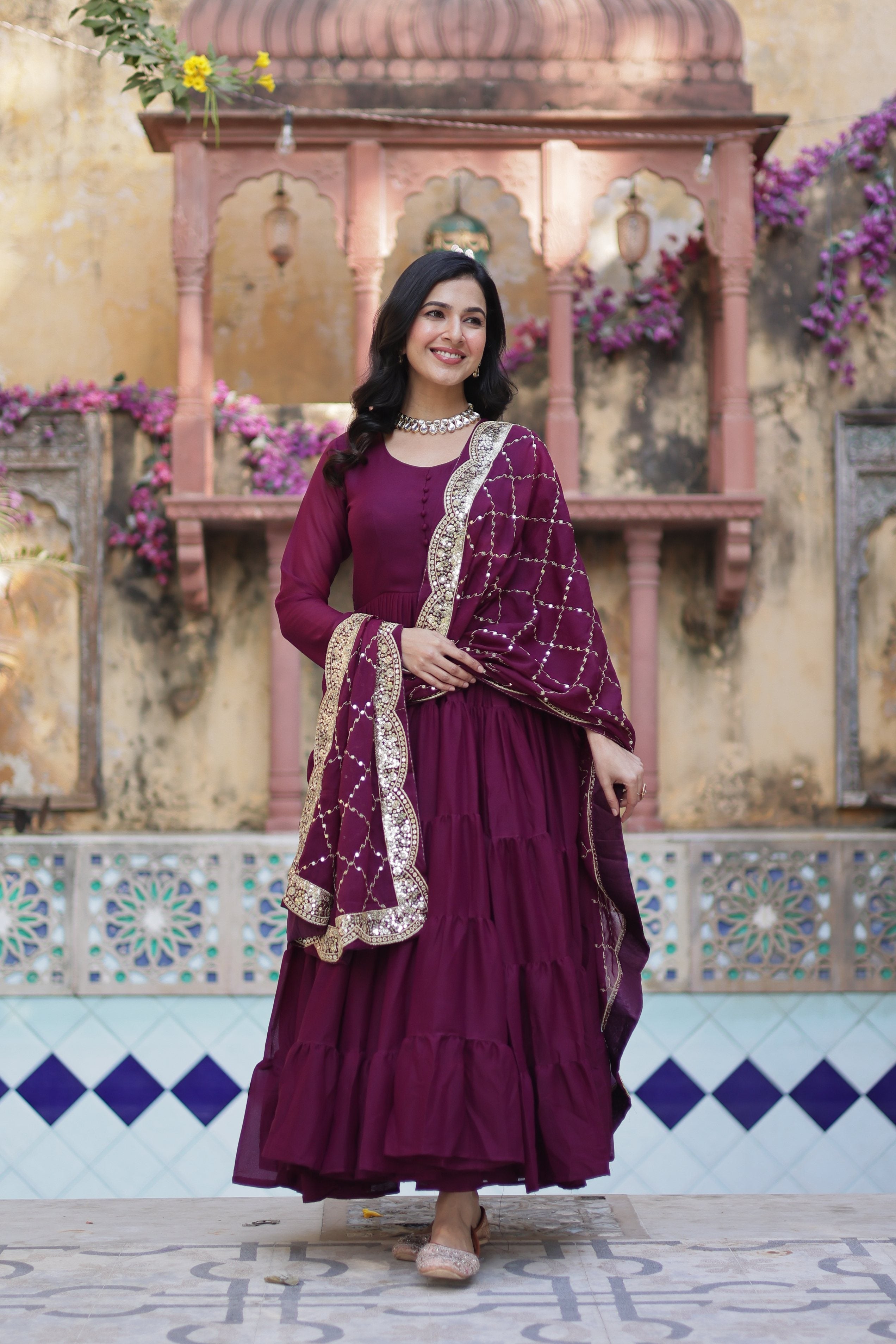Wine colored Star Georgette Anarkali gown with sequins embroidery and 15-meter flair