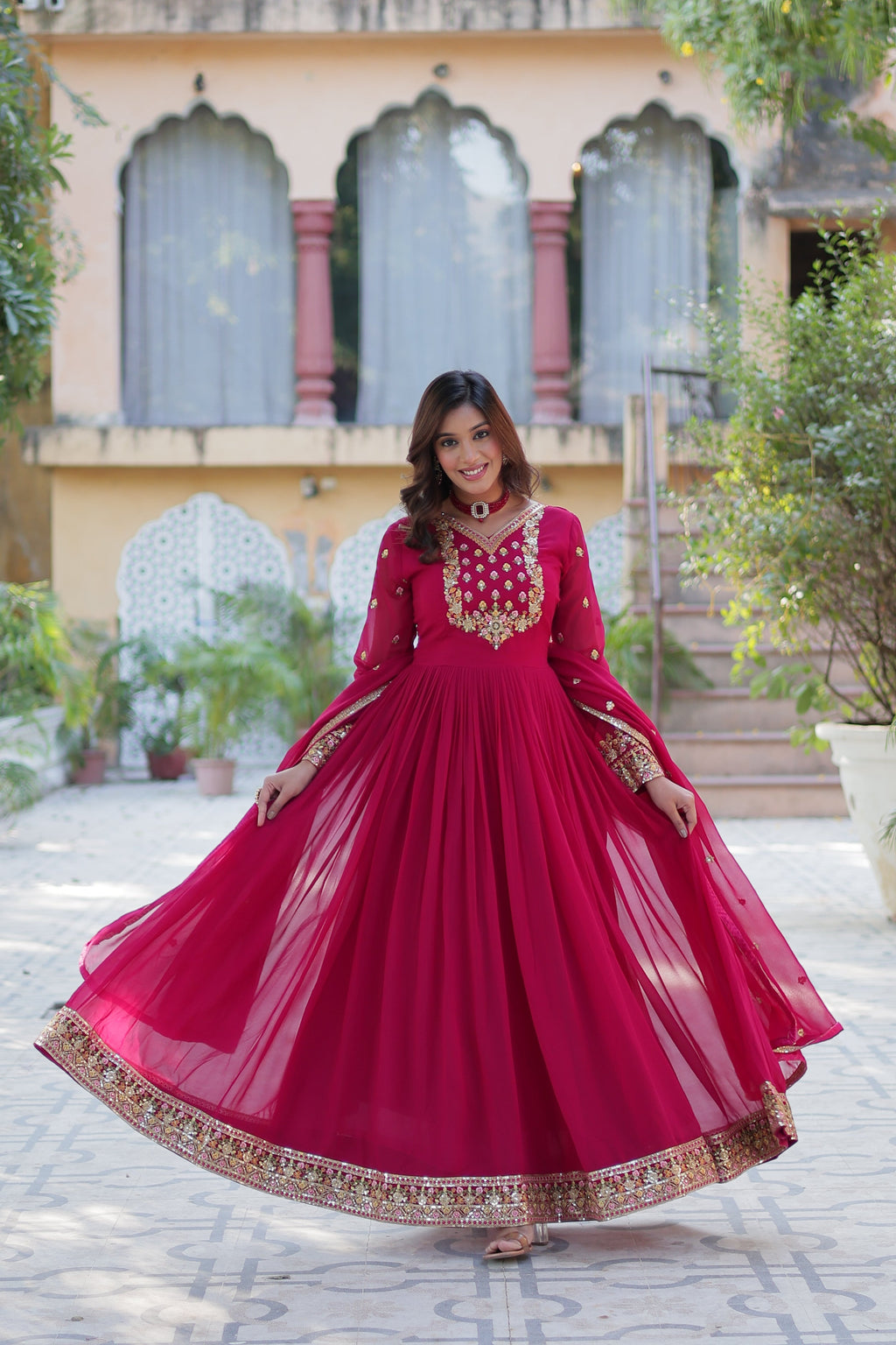 Pink Faux Georgette Anarkali set with rich sequins embroidery and dupatta