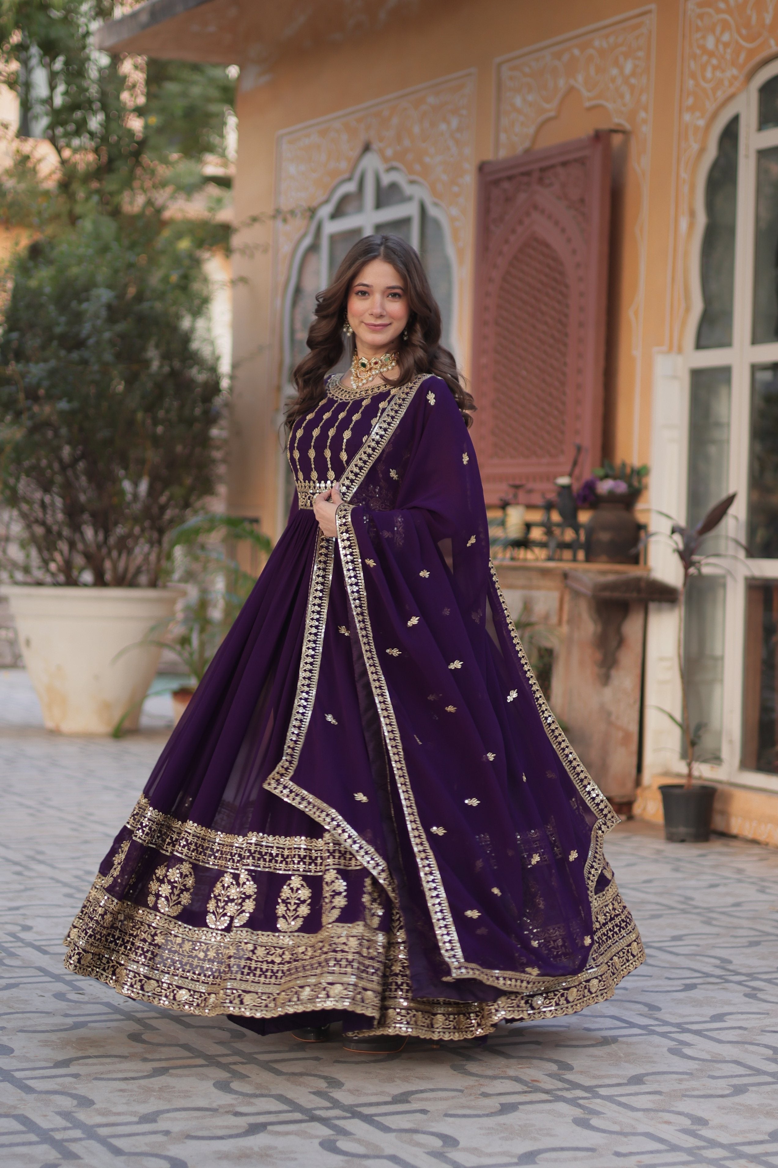 Purple Anarkali set in Faux Blooming fabric with Zari and sequins work