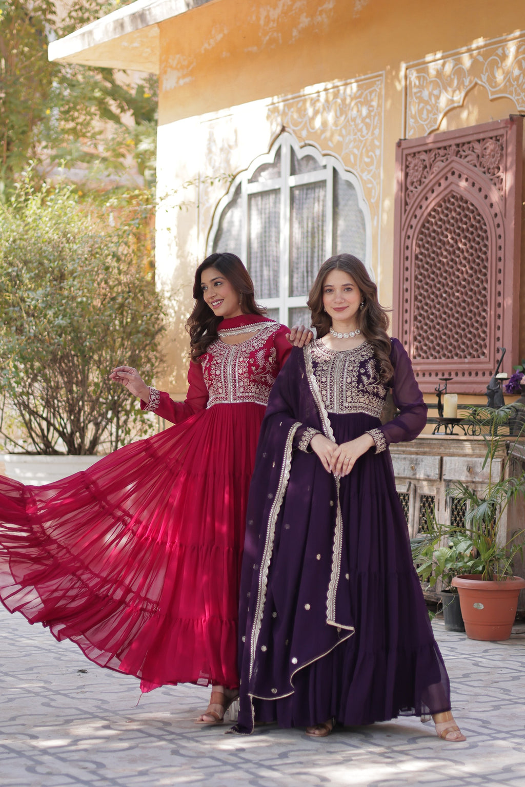 Pink and wine colored faux georgette Anarkali suit with pearl embroidery