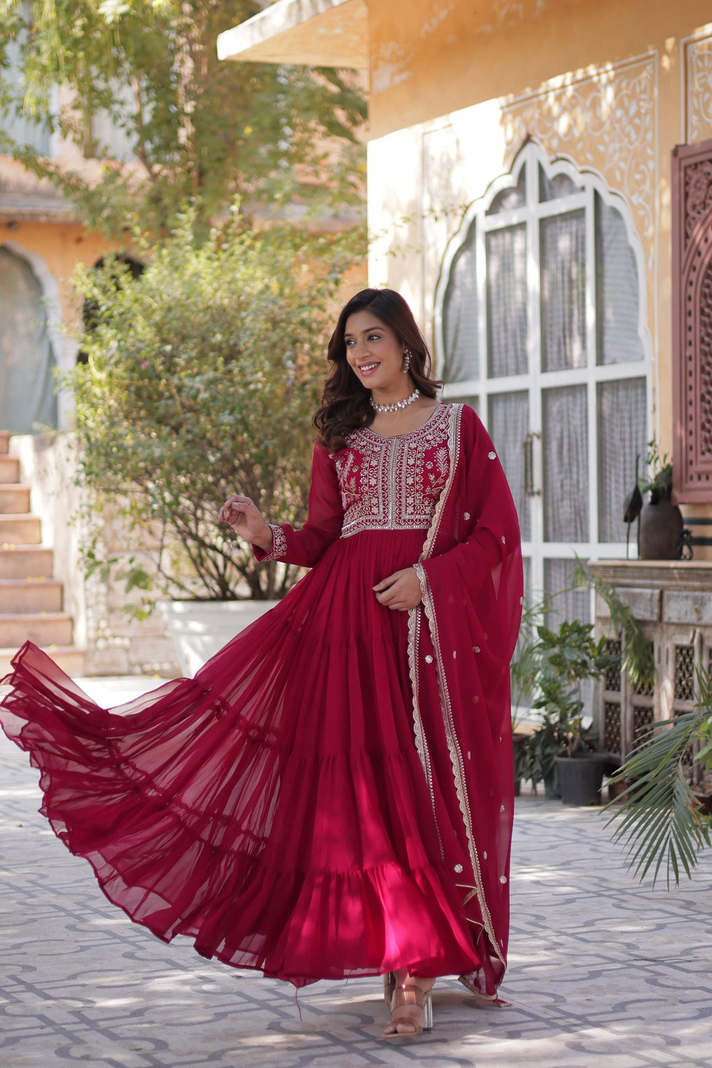 Pink Faux Georgette A-line Anarkali set with intricate pearl embroidery and 12-meter flair