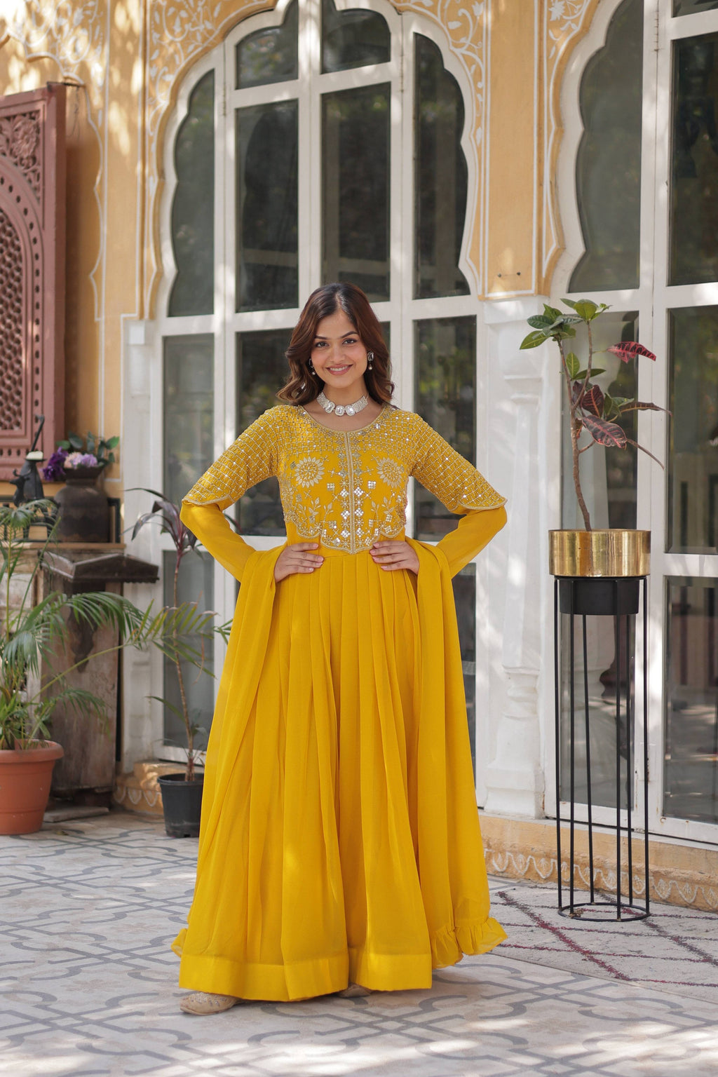 Yellow Faux Georgette embroidered Anarkali set with dupatta and 3.5-meter flair
