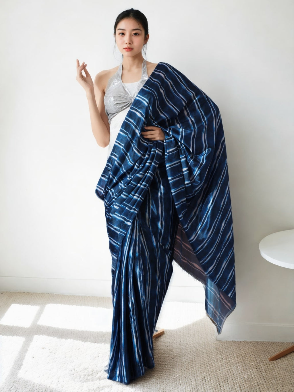 Navy blue Chinon saree with digital prints and lace border, pre-stitched style