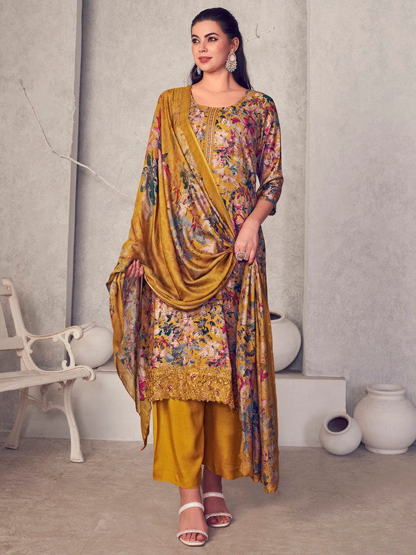 Mustard Pure Pashmina straight kurta with digital print and jacquard details paired with a matching plazo and dupatta.