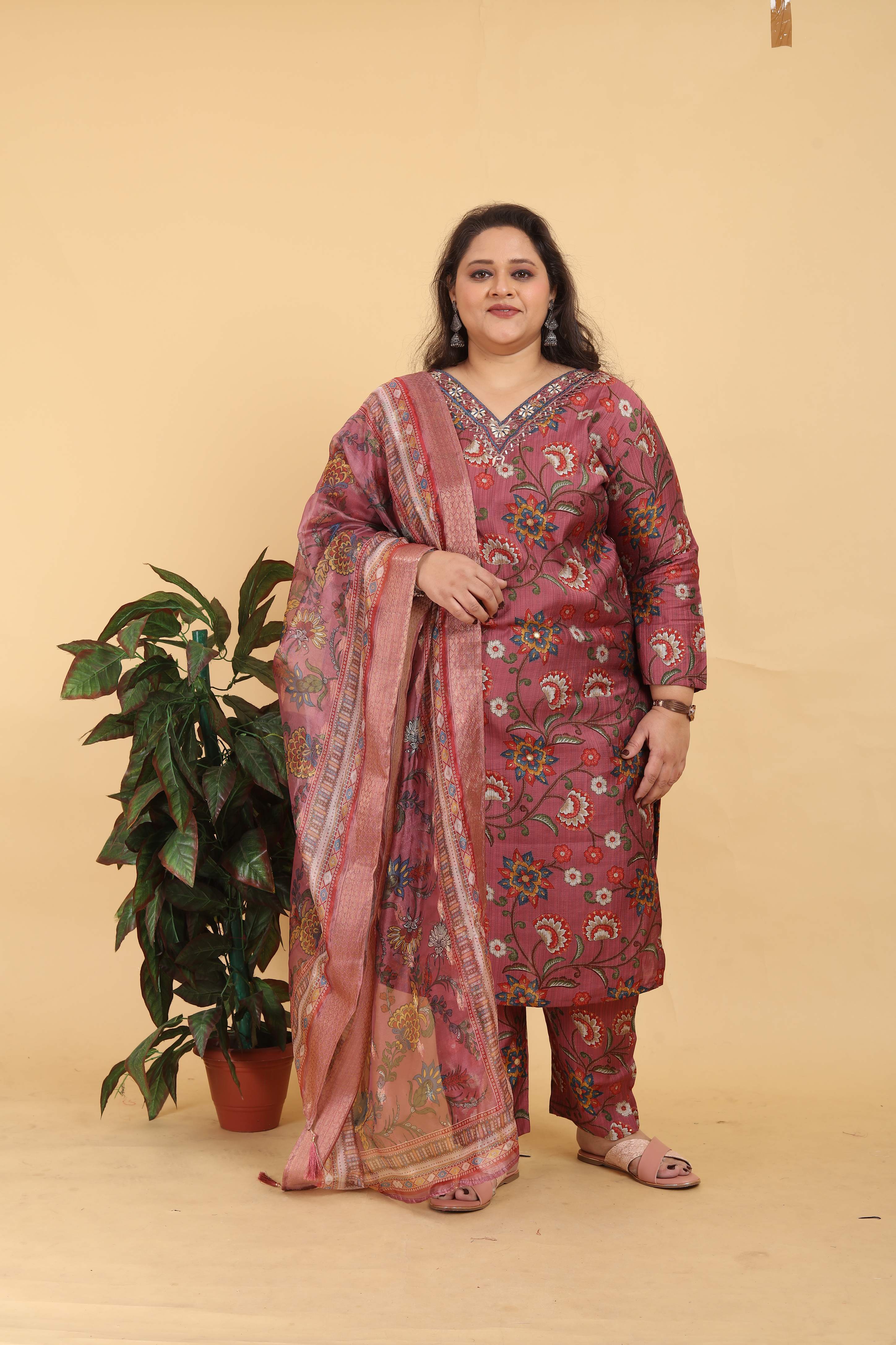 Close up of a brown Lichi Viscose kurta featuring digital prints and detailed handwork, falling below the knee.