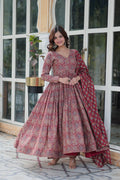 Women wearing a maroon A-line cotton kurta featuring a vibrant floral print