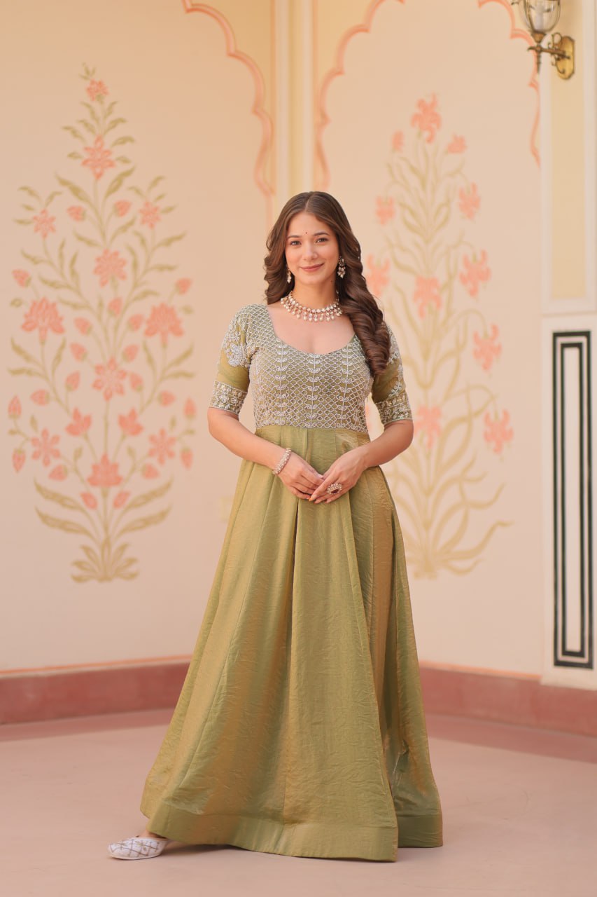 Mehendi green A-line embroidered Anarkali gown with long sleeves and heavy flair