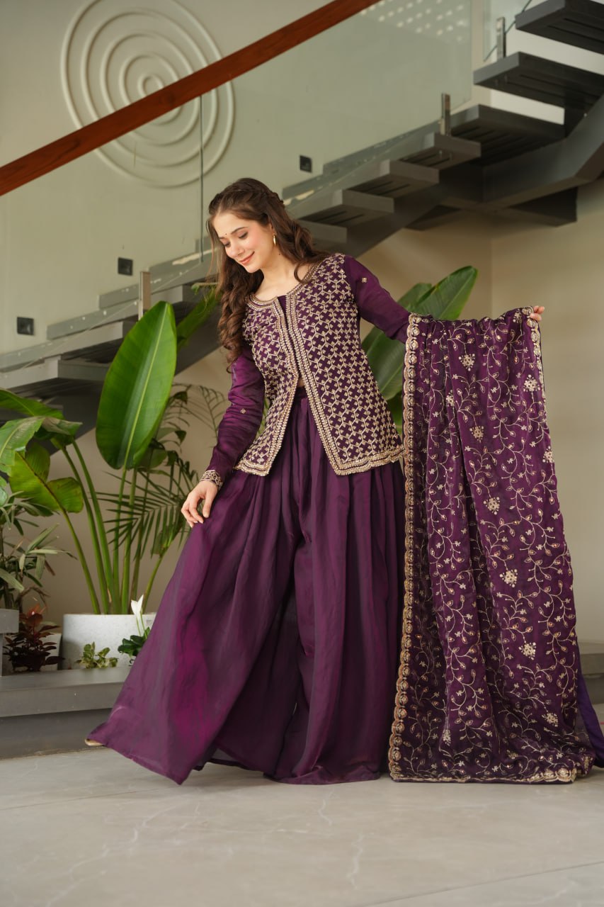 Wine colored Fendi Sharara set with rich bead embroidery and dupatta