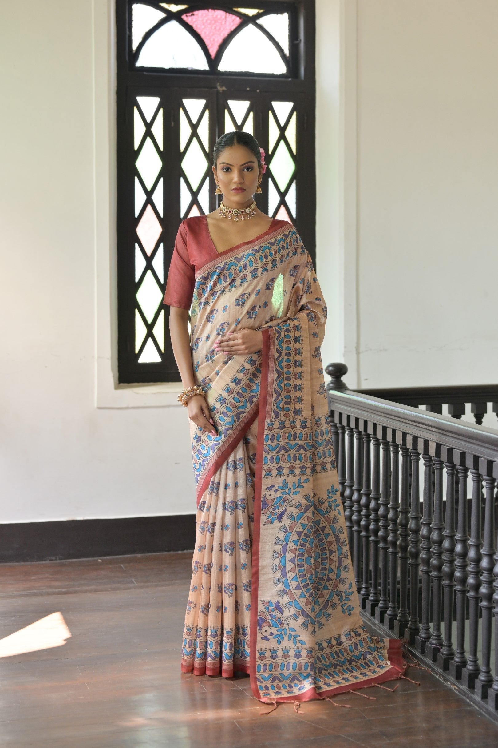 Vibrant red soft tussar silk designer saree with traditional Madhubani print and unstitched blouse