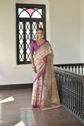 Wine-colored soft Tussar silk designer saree with traditional Madhubani prints and unstitched blouse piece.