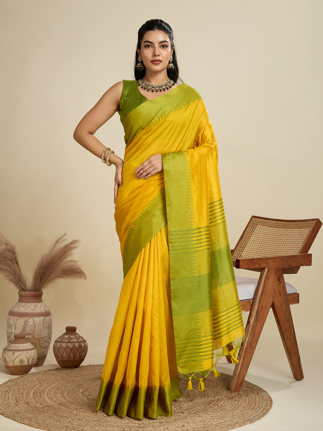 Yellow Khadi raw silk saree with traditional temple woven border and matching blouse