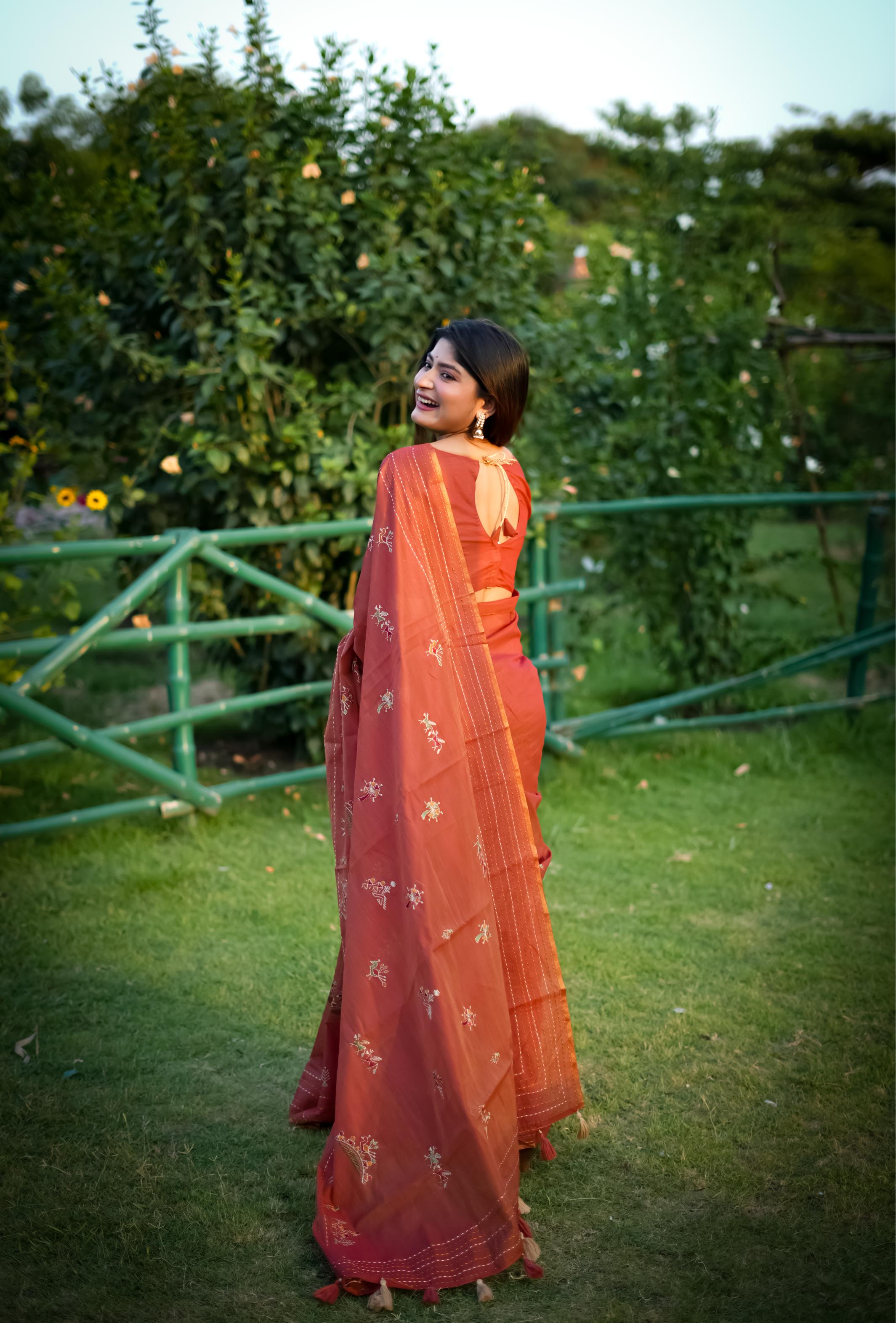 Orange Tussar Silk Saree with Traditional Thread Work