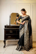 Black handloom raw silk saree with intricate weaving and designer finish