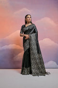Black handloom raw silk designer saree featuring detailed weaving work with unstitched blouse