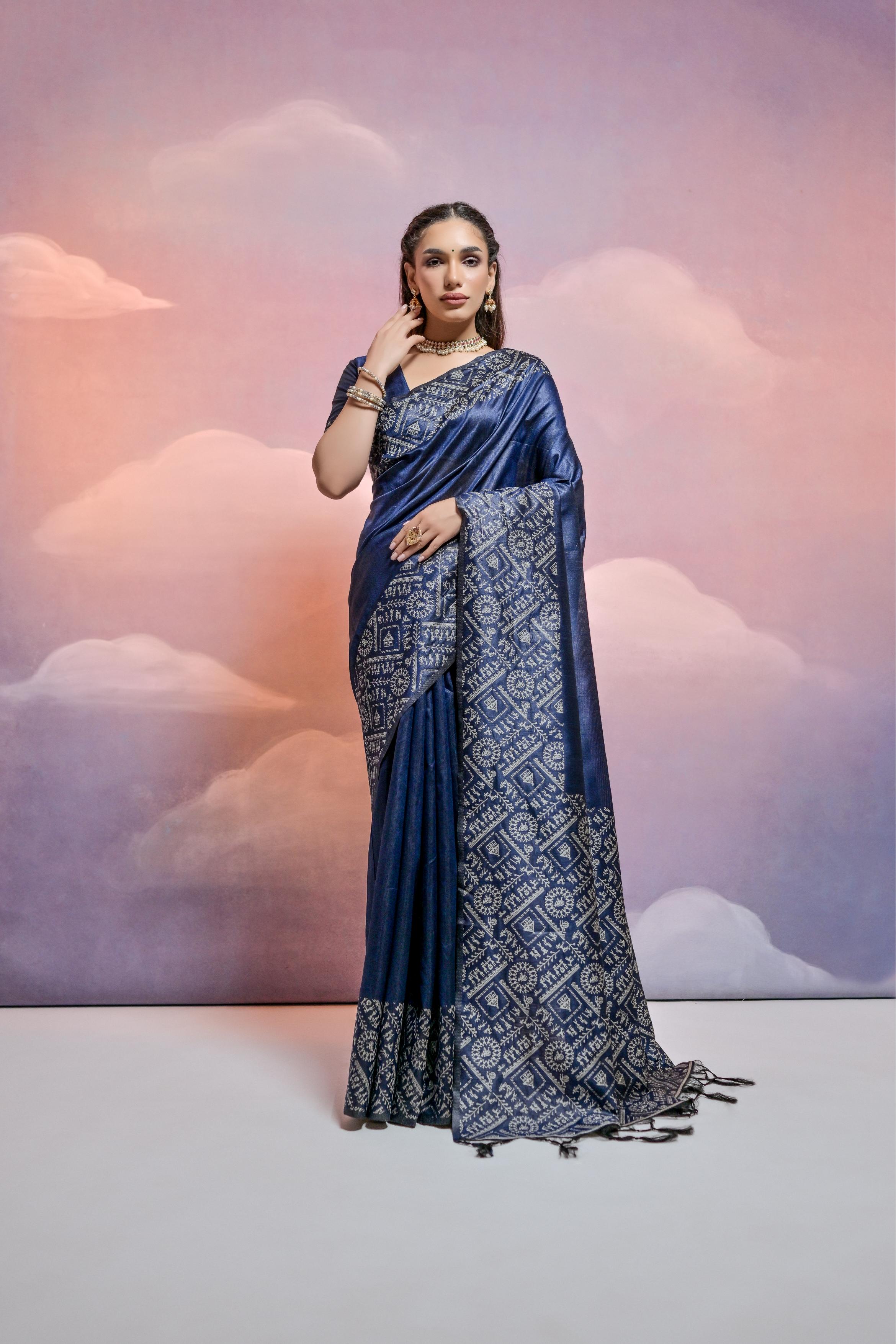 Navy blue handloom raw silk saree with detailed weaving and matching blouse fabric