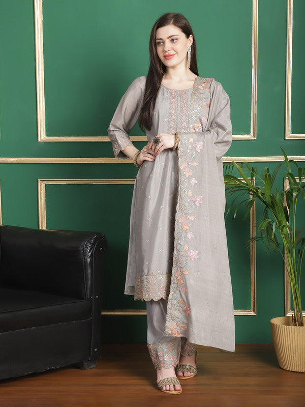 Grey Chinon Chiffon straight suit set featuring floral embroidery, cording, and crystal work details.