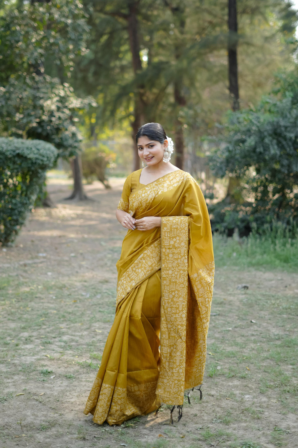 Mustard handloom raw silk saree with detailed weaving pallu and matching blouse piece