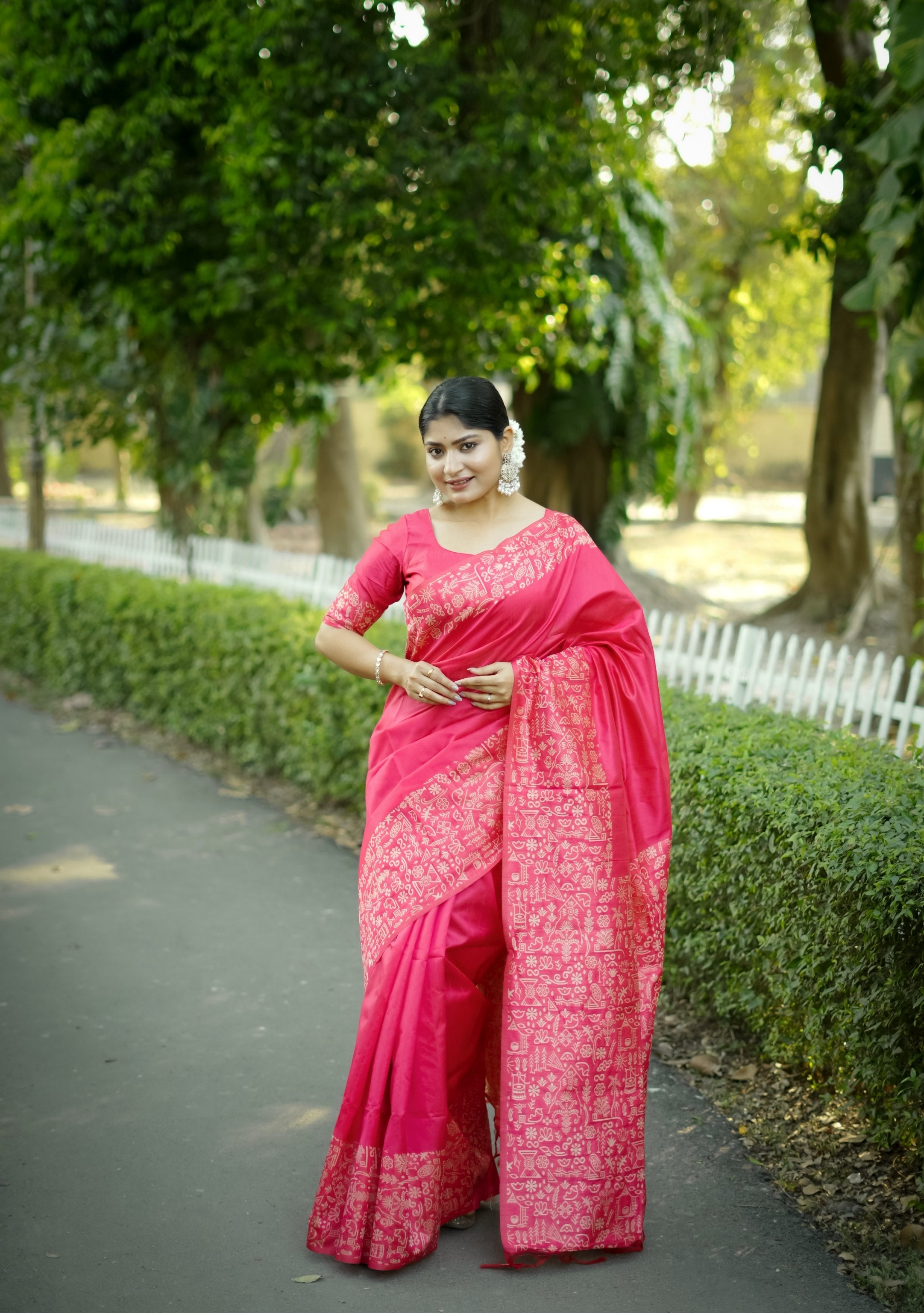 Pink handloom raw silk designer saree with intricate weaving pallu and matching blouse piece