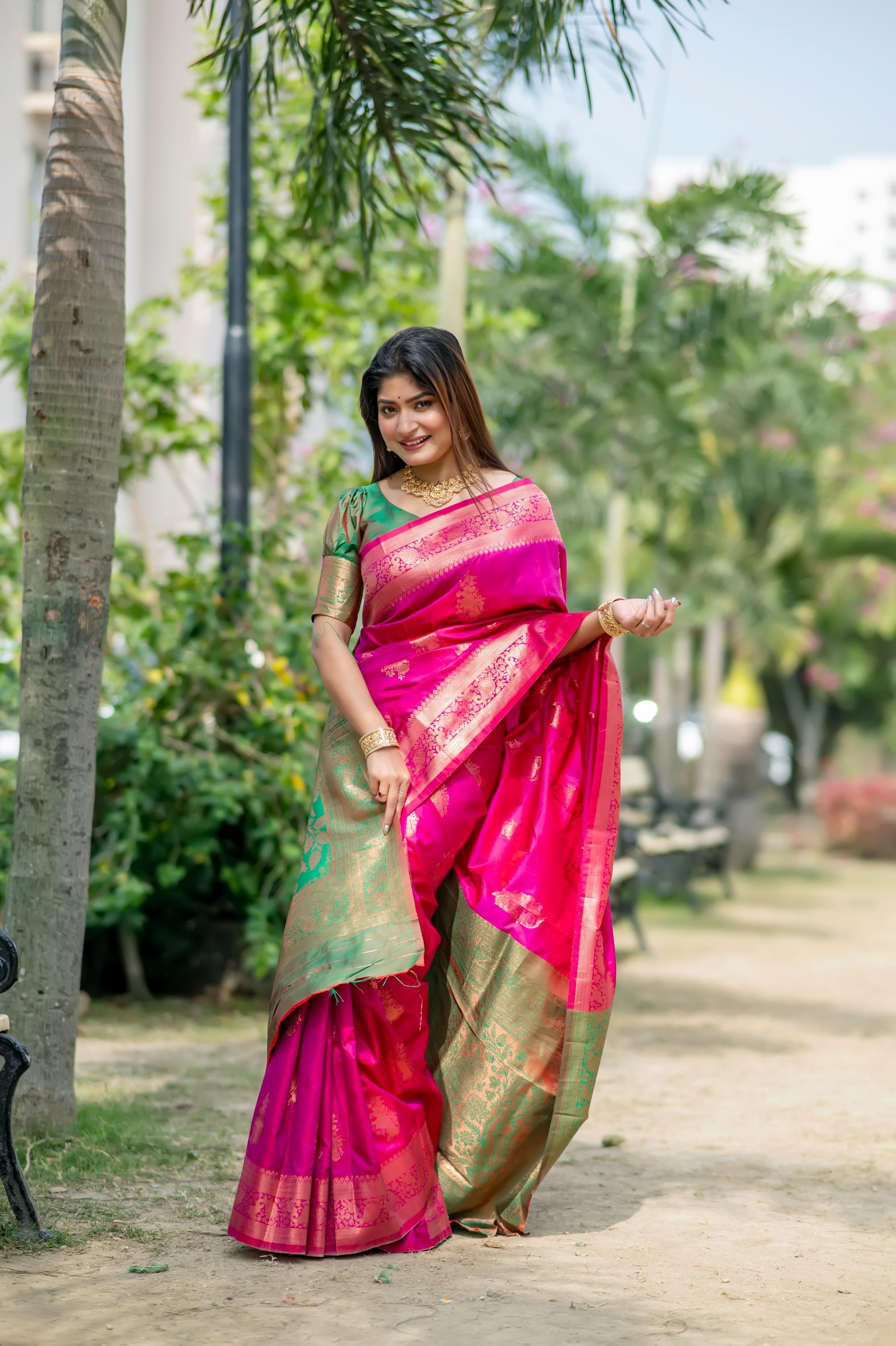 Pink soft Banarasi silk saree with Zari woven detailing and matching blouse piece.