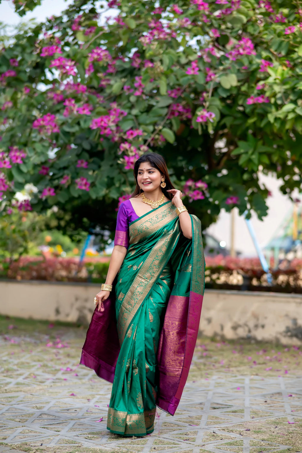 Rama colored soft Banarasi silk saree with traditional zari weaving and blouse.