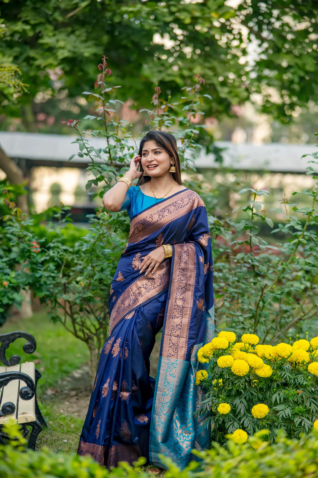 Navy blue Banarasi silk saree with detailed gold Zari weaving