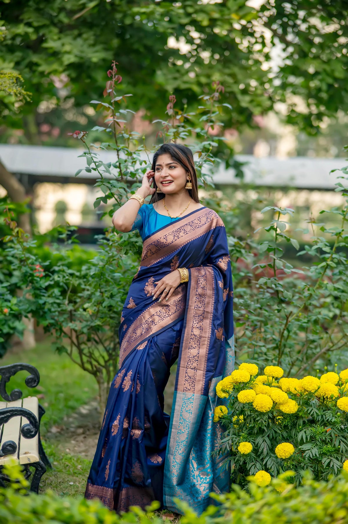 Navy blue Banarasi silk saree with detailed gold Zari weaving