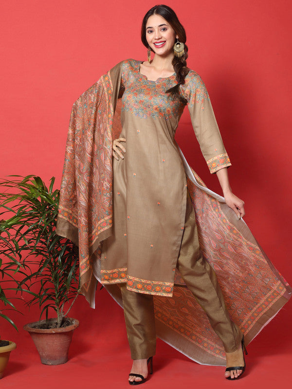 Woman wearing a brown cotton digital printed straight kurta and pants set with a sweetheart neckline