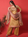 Women wearing a Gold Yellow cotton digital printed straight kurta and matching pants set for festive occasions.