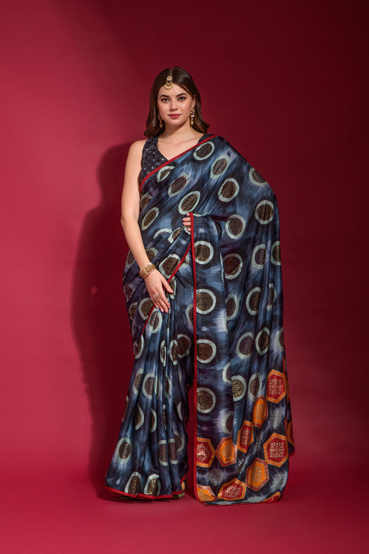 Elegant Navy Blue soft silk saree featuring emboss foil print and piping detail with matching blouse