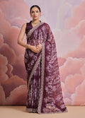Wine colored georgette saree featuring detailed sequin and zari codding embroidery