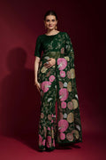 Beautiful green georgette saree embellished with delicate sequence embroidery, styled with a matching blouse.