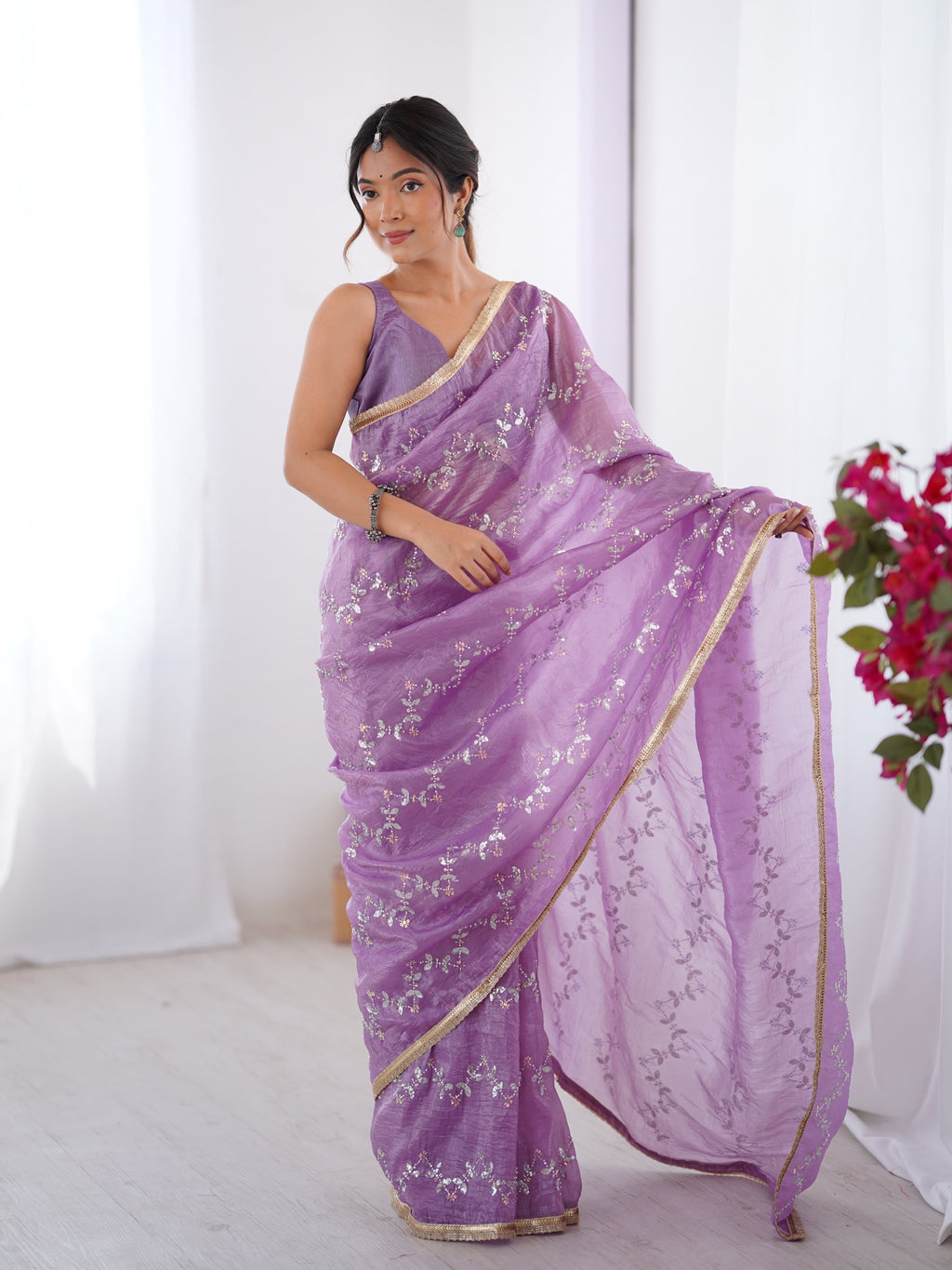 Purple Soft Gold Crush designer saree with intricate Moti and zigzag sequins embroidery.