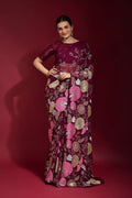 Elegant wine georgette saree with sequence embroidery work and matching blouse piece