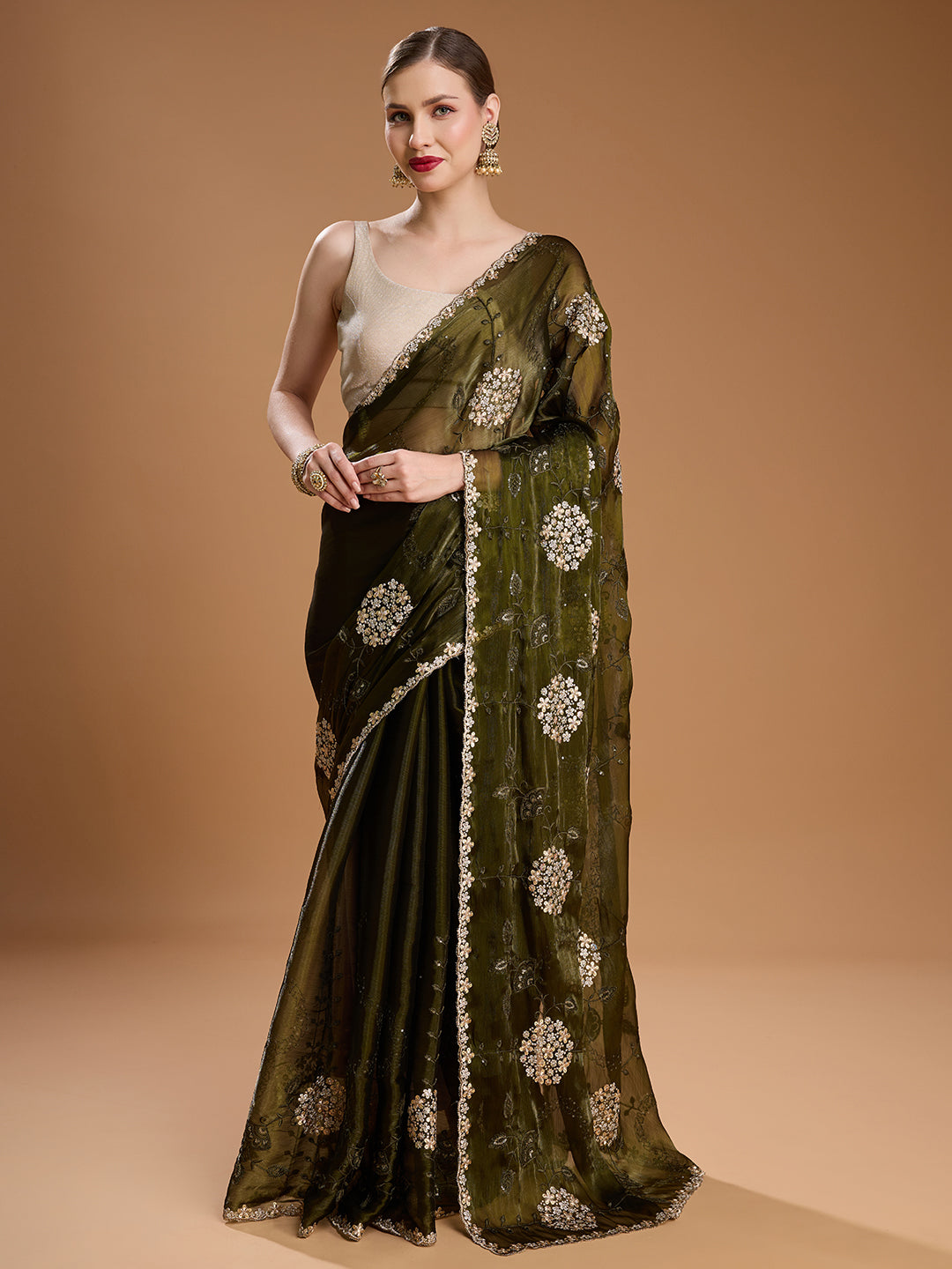 Dark green Jimmy Choo saree with sequins embroidery