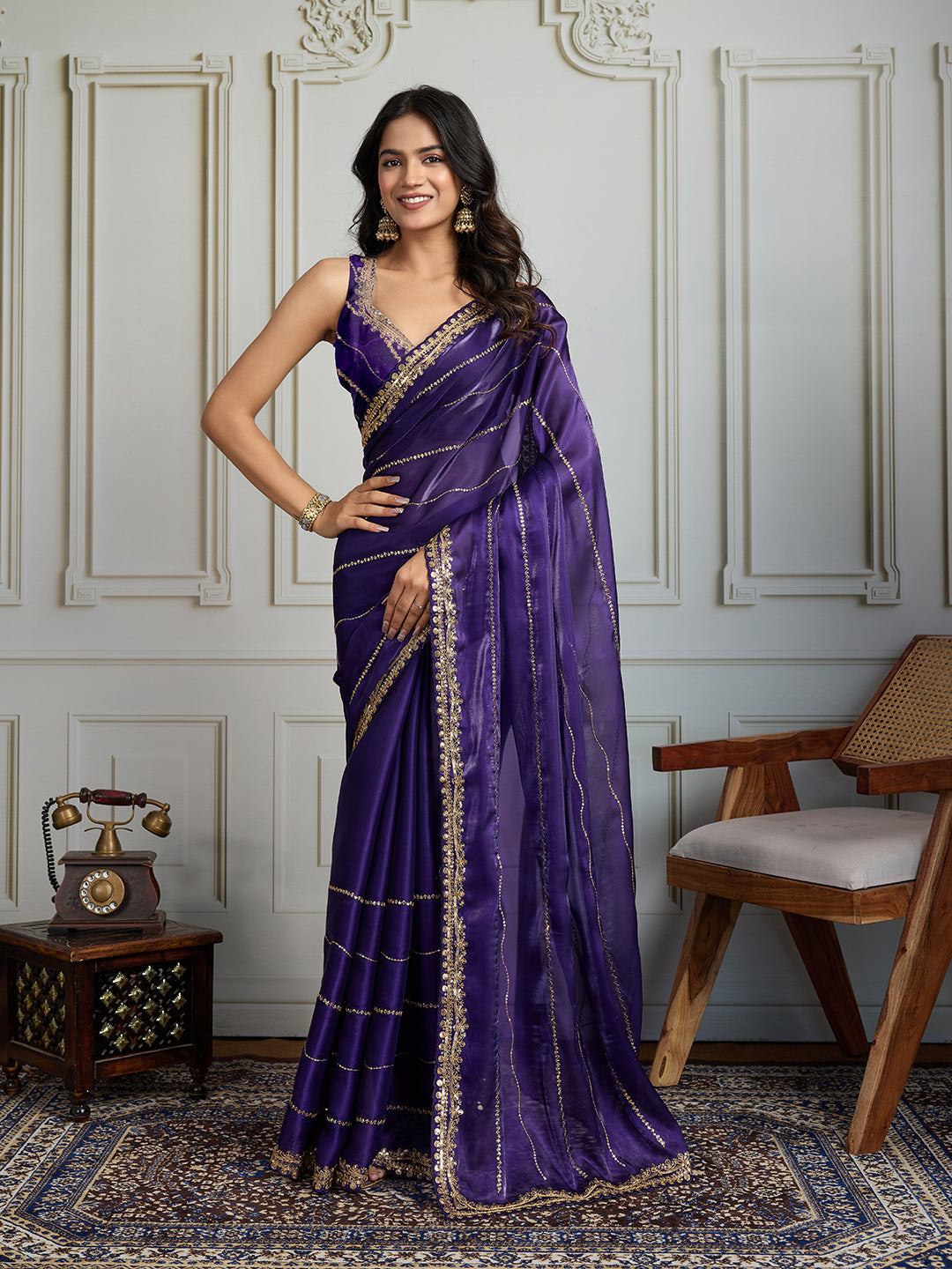 Elegant purple Jimmy Choo designer saree with 3MM sequins and Zari work, paired with a matching blouse.