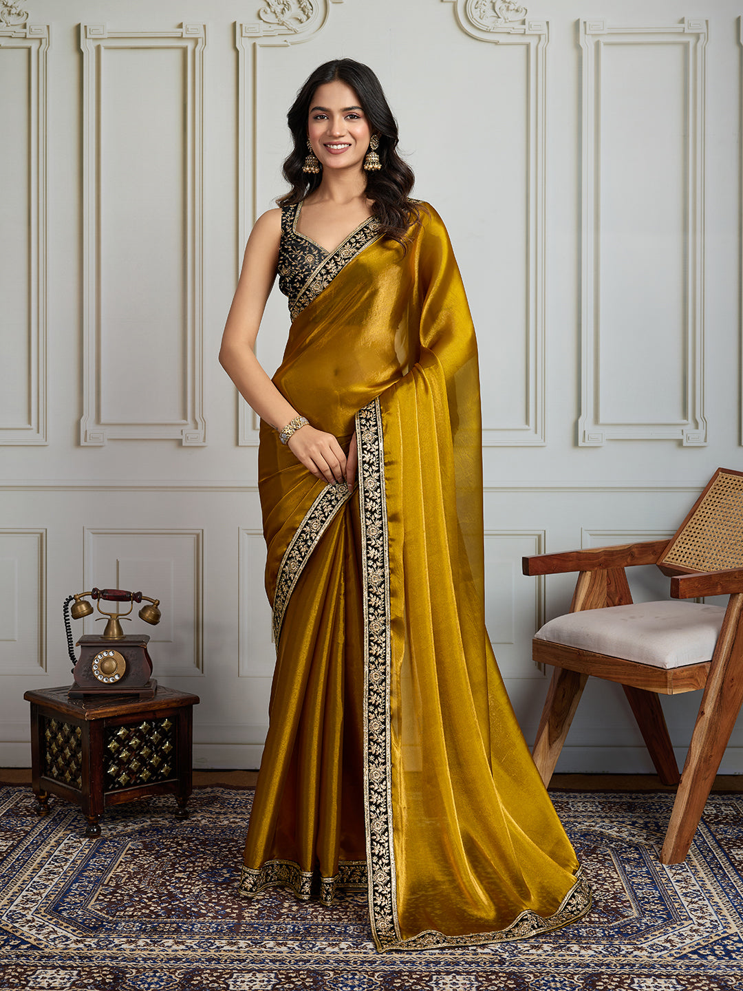 Mustard Satin Silk designer saree with intricate embroidery and a contrasting velvet blouse
