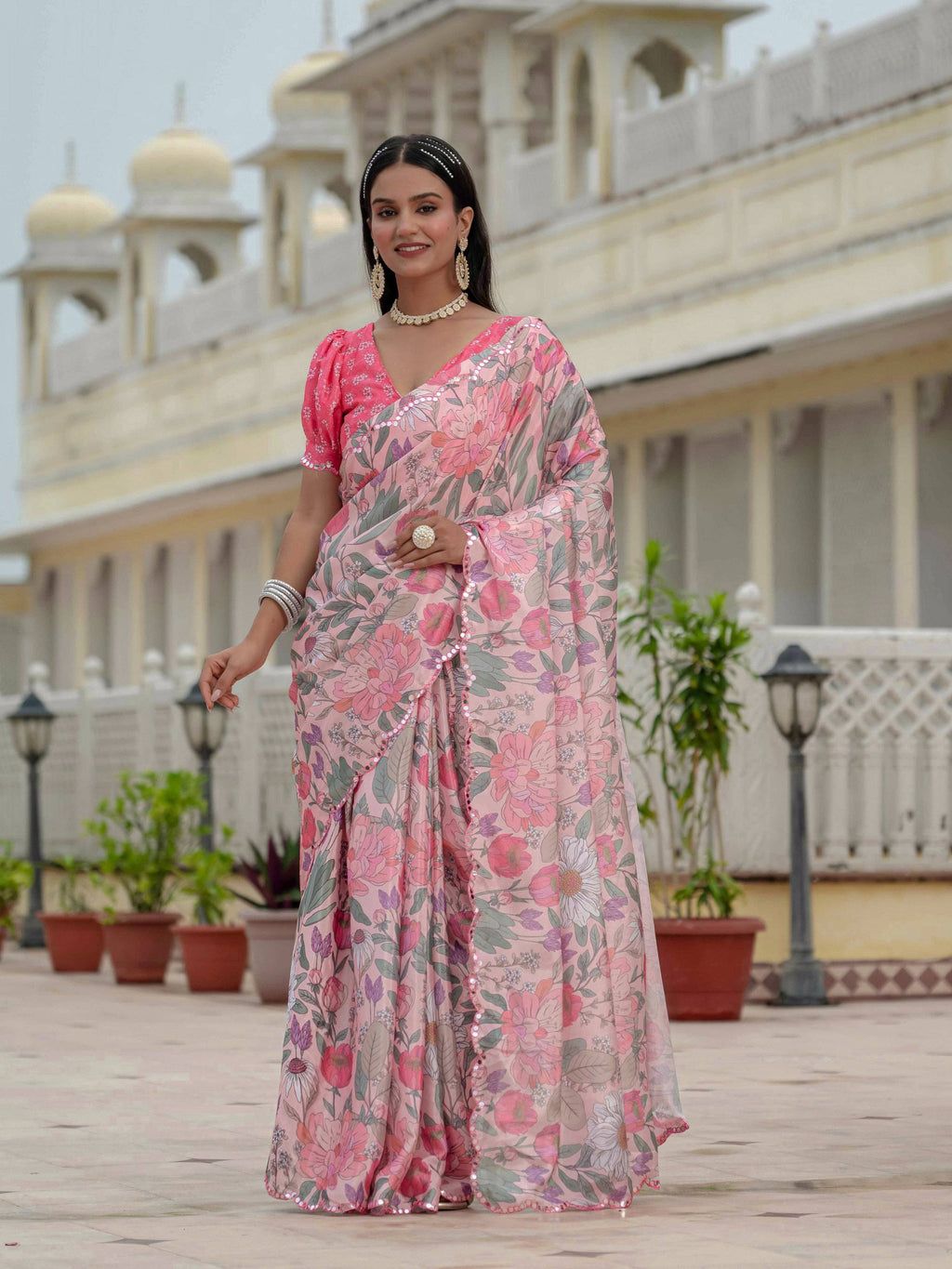 Multicolor Chinon digital print saree with traditional mirror work details.
