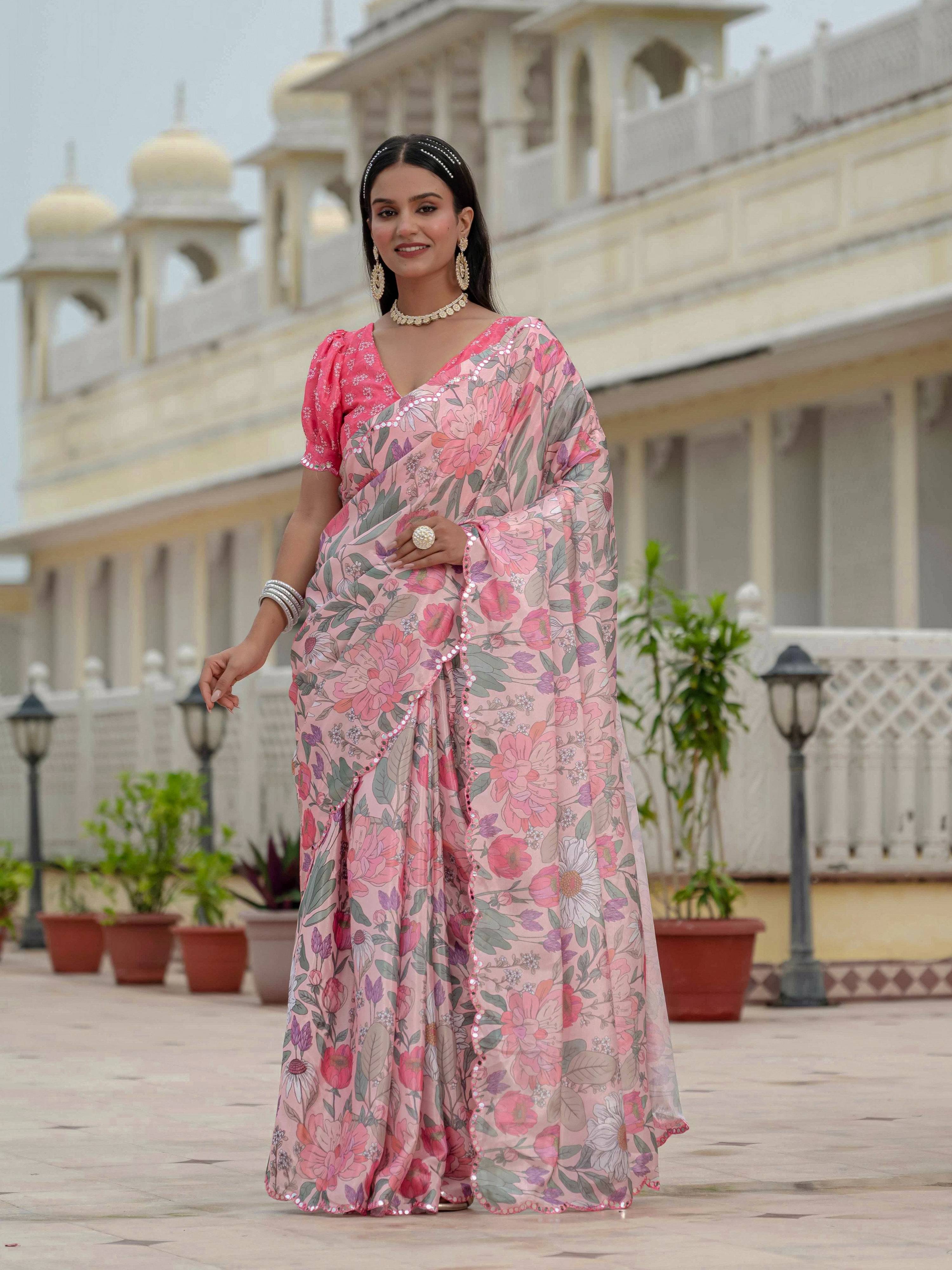 Multicolor Chinon digital print saree with traditional mirror work details.