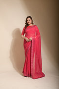 Pink georgette saree featuring detailed sequence embroidery and matching blouse