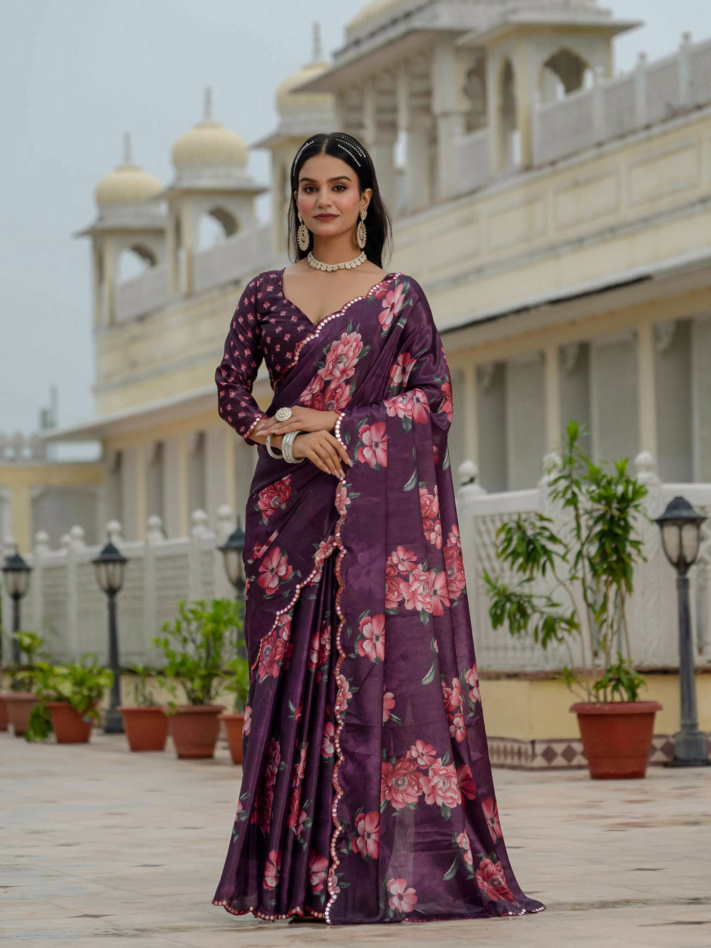 Elegant wine-colored Chinon saree with digital print and mirror work embellishments.