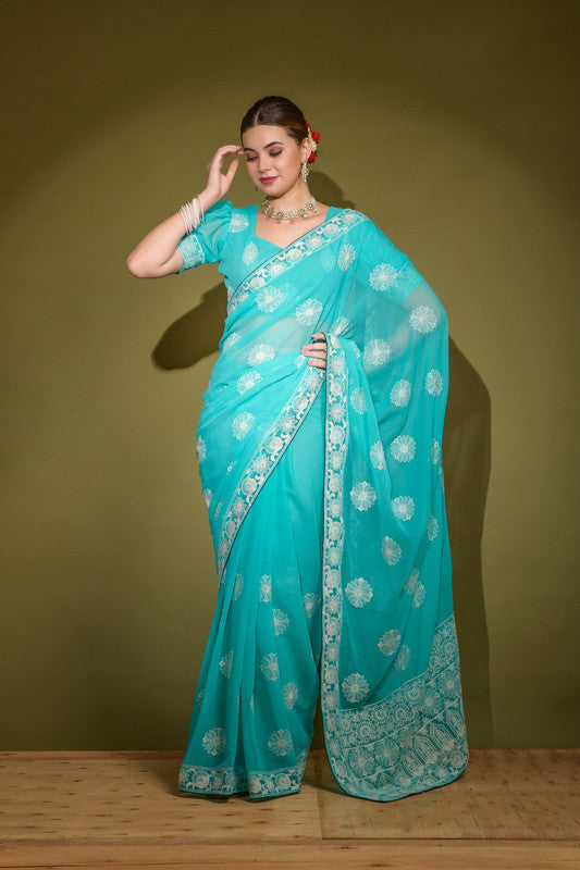 Turquoise georgette saree with intricate Lakhnavi thread embroidery and matching blouse piece